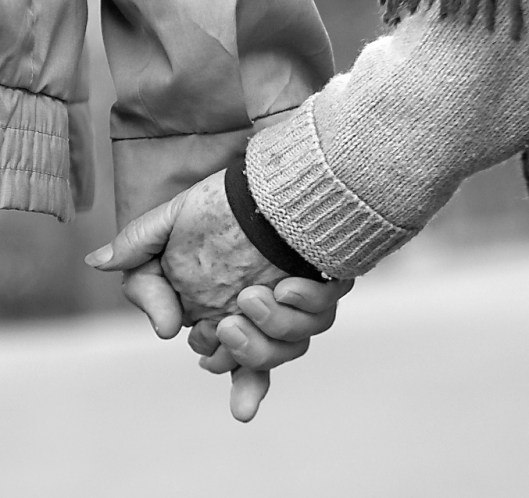 stock-old-couple-holding-hands-wintersmall1